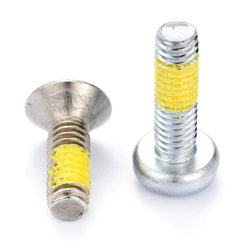 Torx-machineschroef met verzonken kop en gele nylon patch